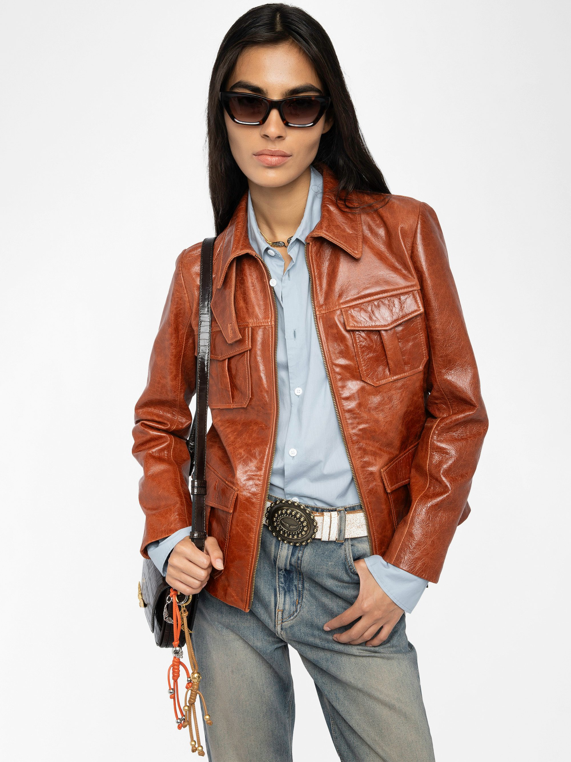 Lienna Leather Jacket - Glossy leather jacket with multiple pockets featuring zip closure and embossed wings on the back.